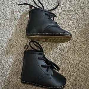 Dr. Martens Black Leather Boots with Classic Design